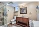 This bathroom features a glass shower, wood floors, and a vanity at 201 S Logan St, Denver, CO 80209