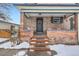 Charming front exterior of a brick home with a welcoming entrance at 201 S Logan St, Denver, CO 80209