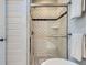 Modern bathroom shower with white subway tile and glass door at 201 S Logan St, Denver, CO 80209