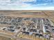 Wide aerial view of the neighborhood at 9694 Truckee St, Commerce City, CO 80022