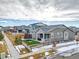Spacious backyard with artificial turf and a trampoline at 9694 Truckee St, Commerce City, CO 80022