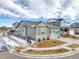 House exterior view showing landscaping and street view at 9694 Truckee St, Commerce City, CO 80022