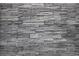 Close up of a gray stone accent wall at 9694 Truckee St, Commerce City, CO 80022