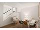 Cozy sitting area with staircase, two chairs, and a small table with a lamp at 1120 N Clarkson St # 6, Denver, CO 80218