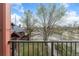 Scenic balcony offering an outdoor space with views of the neighborhood and surrounding trees at 2922 W 26Th Ave # 1, Denver, CO 80211