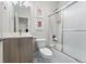 Bathroom with single vanity, toilet, and shower/tub combination at 2922 W 26Th Ave # 1, Denver, CO 80211