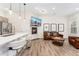 Stylish living room boasts a cozy fireplace and comfortable seating, perfect for relaxation and entertainment at 2922 W 26Th Ave # 1, Denver, CO 80211
