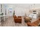 Cozy open-concept living room and kitchen area, offering a welcoming space with a view, for relaxation at 2922 W 26Th Ave # 1, Denver, CO 80211