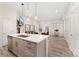 Open-concept living space with kitchen island, fireplace, and comfortable seating area, offering a welcoming and modern feel at 2922 W 26Th Ave # 1, Denver, CO 80211