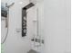 A sleek glass shower with modern fixtures, white tile, and a built-in bench at 2922 W 26Th Ave # 1, Denver, CO 80211