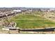 Overhead aerial view of the community park, with soccer fields, walking paths, a pond, and trees at 9804 Martin Luther King Blvd, Denver, CO 80238