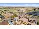 An aerial view of homes with solar panels close to green space and parking at 9804 Martin Luther King Blvd, Denver, CO 80238