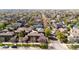 Live in a neighborhood with sidewalks, green space, and mature trees at 9804 Martin Luther King Blvd, Denver, CO 80238