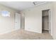 Empty bedroom featuring neutral walls and a closet space at 9804 Martin Luther King Blvd, Denver, CO 80238