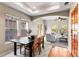 Open-concept space combining the dining and living areas, featuring natural light at 9804 Martin Luther King Blvd, Denver, CO 80238