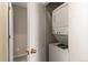 Conveniently located laundry area with a stacked washer and dryer at 9804 Martin Luther King Blvd, Denver, CO 80238