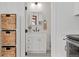 Tastefully updated bathroom with black and white tiled floors at 1763 N Williams St # 101, Denver, CO 80218