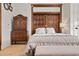 A comfortable bedroom with hardwood floors and vintage furnishings at 1763 N Williams St # 101, Denver, CO 80218