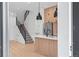 Bright kitchen with stainless steel appliances, white countertops, and wood cabinets at 1254 Yates St, Denver, CO 80204