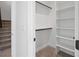 Well-organized walk-in closet with built-in shelving and rods for ample storage and organization of your wardrobe at 1254 Yates St, Denver, CO 80204