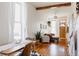 Bright and airy living room featuring an open layout, hardwood floors, and stylish furnishings with natural light at 2841 W 27Th Ave, Denver, CO 80211