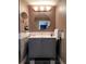 Bathroom featuring a vanity, oval mirror and updated light fixture at 13187 E Bethany Pl, Aurora, CO 80014