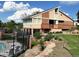 Community clubhouse with a deck, outdoor space and landscaping in a Gathering-friendly neighborhood at 13187 E Bethany Pl, Aurora, CO 80014