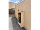 Exterior trash storage nook with privacy wall next to backyard stairs and gravel path at 13187 E Bethany Pl, Aurora, CO 80014
