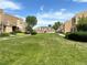 Expansive grassy area in a well-maintained community enhances curb appeal and provides recreational space at 13187 E Bethany Pl, Aurora, CO 80014