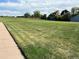 Expansive grassy common area surrounded by homes in a well-maintained community at 13187 E Bethany Pl, Aurora, CO 80014