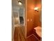 Hallway with a view of the stairs and a bathroom with a sink at 13187 E Bethany Pl, Aurora, CO 80014