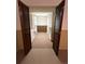 Large walk-in closet with built-in shelving and paneled accent wall at 13187 E Bethany Pl, Aurora, CO 80014