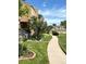 The property boasts lush green lawns, mature trees, and meticulously landscaped areas, enhancing the townhome's appeal at 13187 E Bethany Pl, Aurora, CO 80014