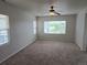 Spacious bedroom with natural light and ceiling fan at 11811 E Maplewood Ave, Englewood, CO 80111