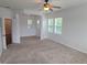 Spacious bedroom with natural light and ceiling fan at 11811 E Maplewood Ave, Englewood, CO 80111