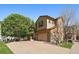 Charming two-story home features a spacious driveway, well-kept lawn, and appealing exterior paint scheme at 11811 E Maplewood Ave, Englewood, CO 80111