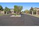 Attractive street view with manicured landscaping and gated entrance at 11811 E Maplewood Ave, Englewood, CO 80111