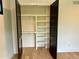 Large open closet with shelving unit and hanging rods at 2442 S Saint Paul St, Denver, CO 80210