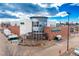 Aerial view of a commercial building featuring a Whole Foods Market with brick facade and ample parking at 2442 S Saint Paul St, Denver, CO 80210