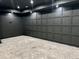 Home theater room featuring dark walls, recessed lighting, and custom paneling for an immersive experience at 2442 S Saint Paul St, Denver, CO 80210