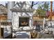 Outdoor fireplace on the patio with seating, great for gatherings at 5795 S Pagosa Way, Centennial, CO 80015