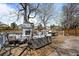 Relax in style on this outdoor deck featuring a fireplace and ample seating at 5795 S Pagosa Way, Centennial, CO 80015
