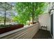 Charming balcony with planter boxes offering a peaceful outdoor retreat at 1050 S Monaco Pkwy # 35, Denver, CO 80224