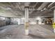 Large, unfinished basement provides ample space for storage or customization at 1050 S Monaco Pkwy # 35, Denver, CO 80224