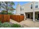 Charming exterior view showcasing the home's architecture, landscaping, and private entrance at 1050 S Monaco Pkwy # 35, Denver, CO 80224