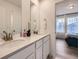 This bathroom features double sinks with modern fixtures and finishes at 2967 S Quaker St, Morrison, CO 80465