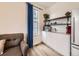 Compact kitchenette equipped with modern appliances, a sink, and a stylish countertop at 2967 S Quaker St, Morrison, CO 80465