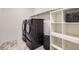 Contemporary laundry room with black washer and dryer at 2967 S Quaker St, Morrison, CO 80465