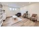 The living room features modern hardwood flooring, recessed lighting, and ample seating at 2967 S Quaker St, Morrison, CO 80465