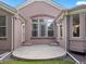 Backyard view of home exterior and patio at 6700 W Dorado Dr # 47, Littleton, CO 80123